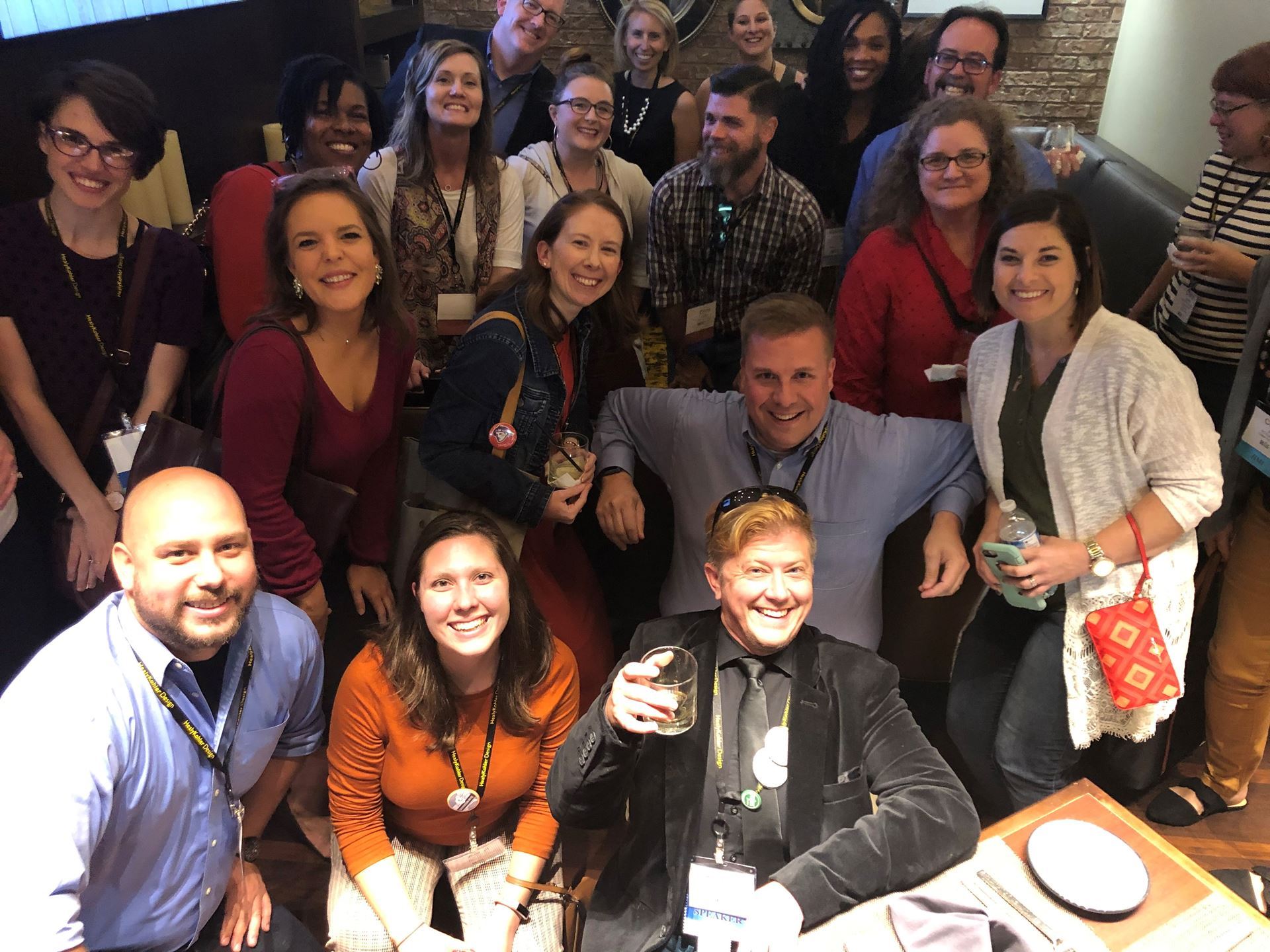 Group of mid-career SEMC professionals looking up at the camera. Group is in the bar at the Marriott in Charleston, SC at SEMC2019